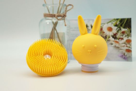 El conejo amarillo de la lufa del silicón del dispensador del jabón formó